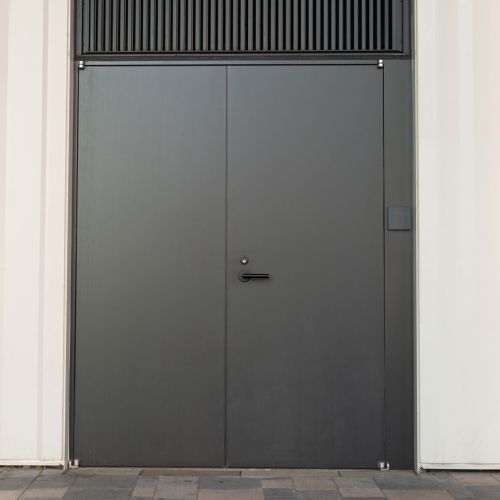 Grey Metal Pivot Doors
